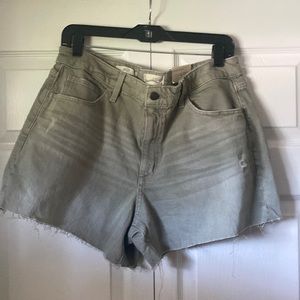 Distressed green shorts size 14